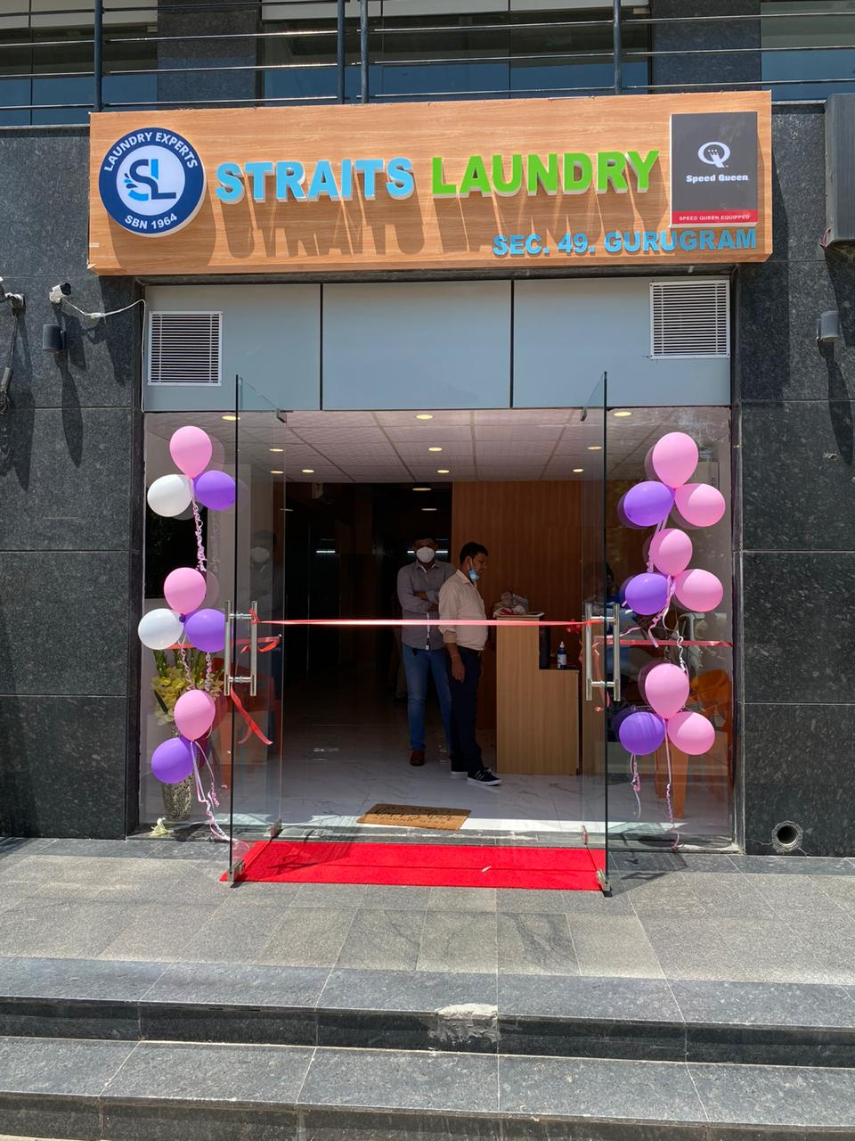 Company Logo For Straits Laundry'