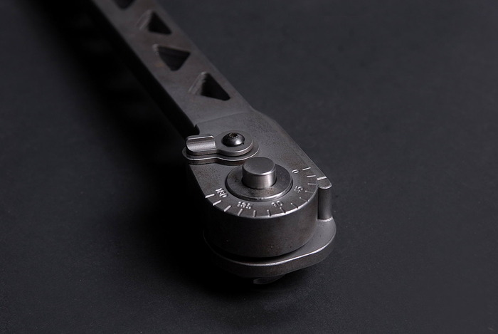 A closeup of the release button on the new Cole-Bar Hammer