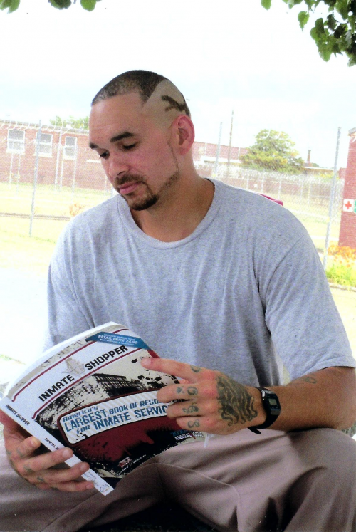 Inmate reading book'