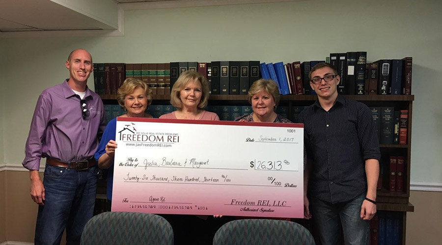 Company Logo For Freedom Home Buyers'