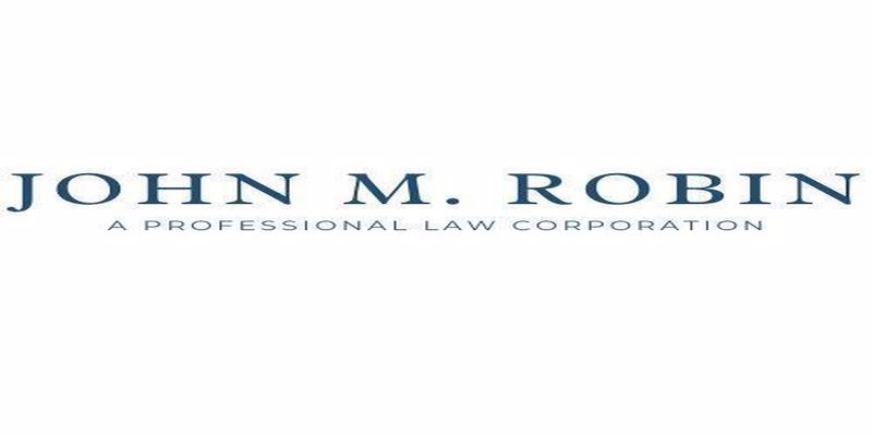 Company Logo For John M. Robin'