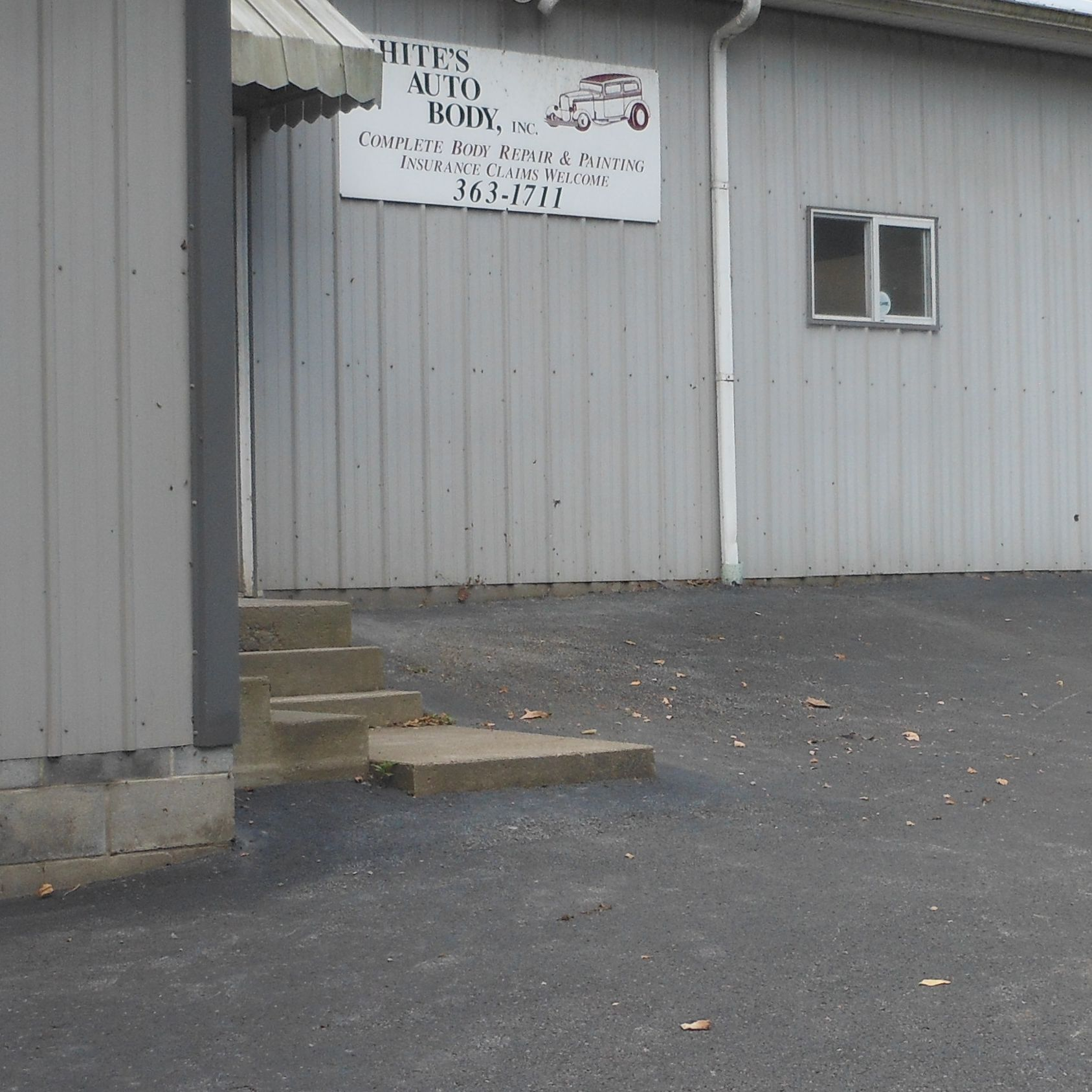 Company Logo For White's Auto Body'