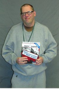 inmate showing his copy of INSH