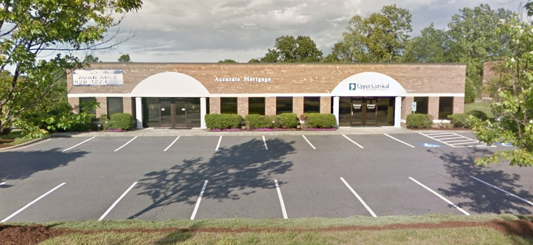 Company Logo For Healthy Living Spinal Care'