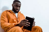 Prisoner reading book