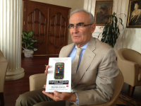 Gov. Hussein with Disconnect Book