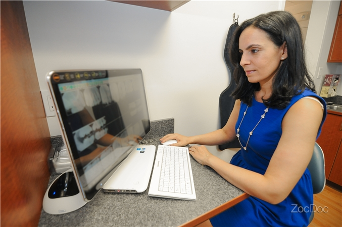 Dr. Marjan Moghadam, DDS'