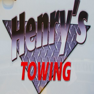 Henry's Towing Service Logo