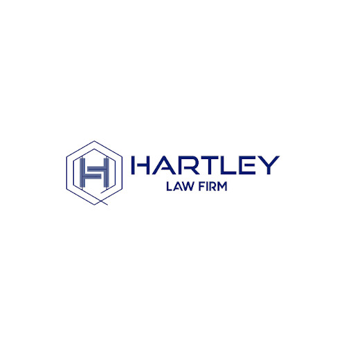 Company Logo For Hartley Law Firm'