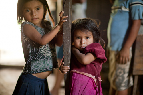 Two young girls in the Agros village "Nueva Esperanza" locat'