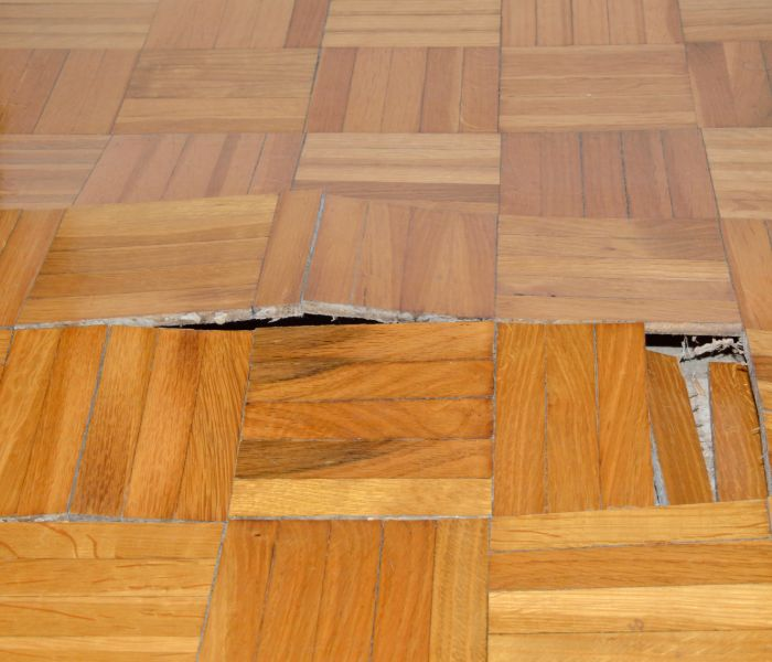 damaged floor from foundation issue'