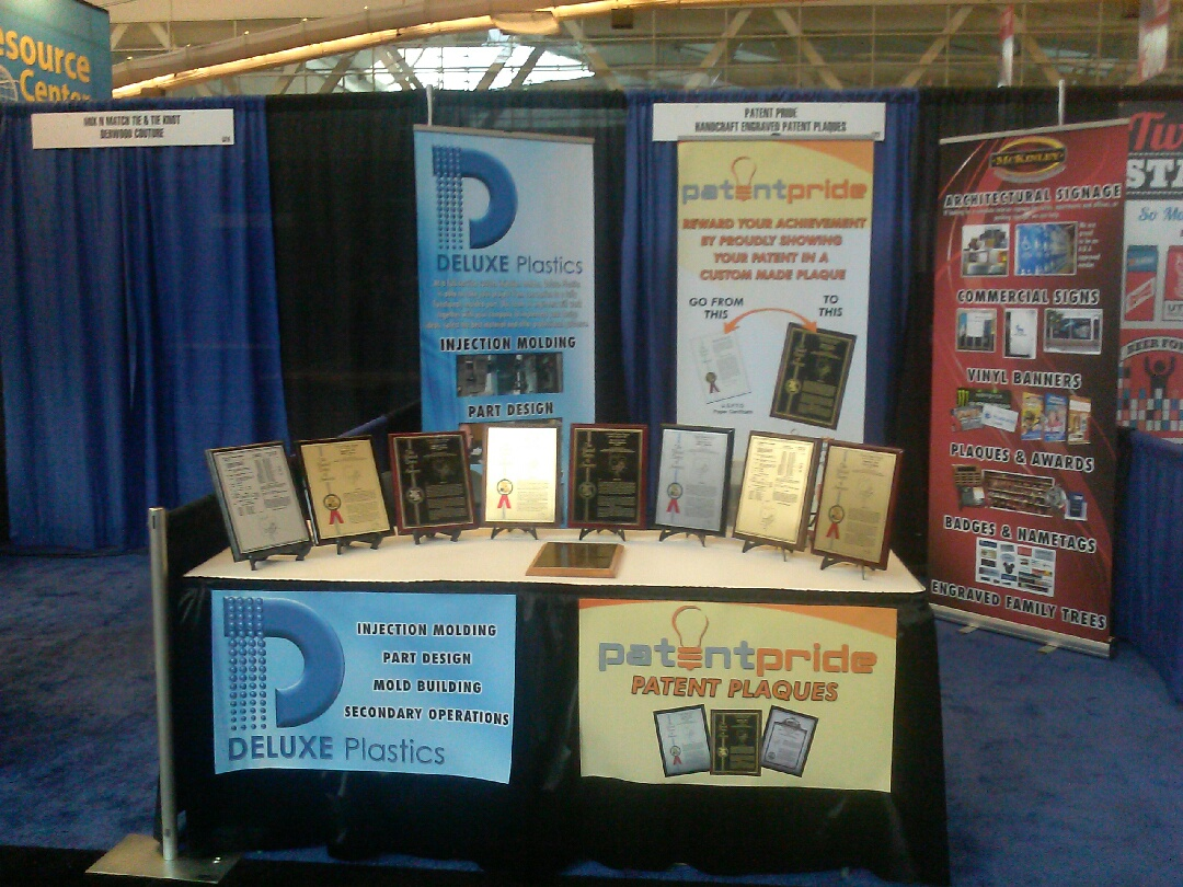 PatentPride.com INPEX 2013 booth patent plaques'