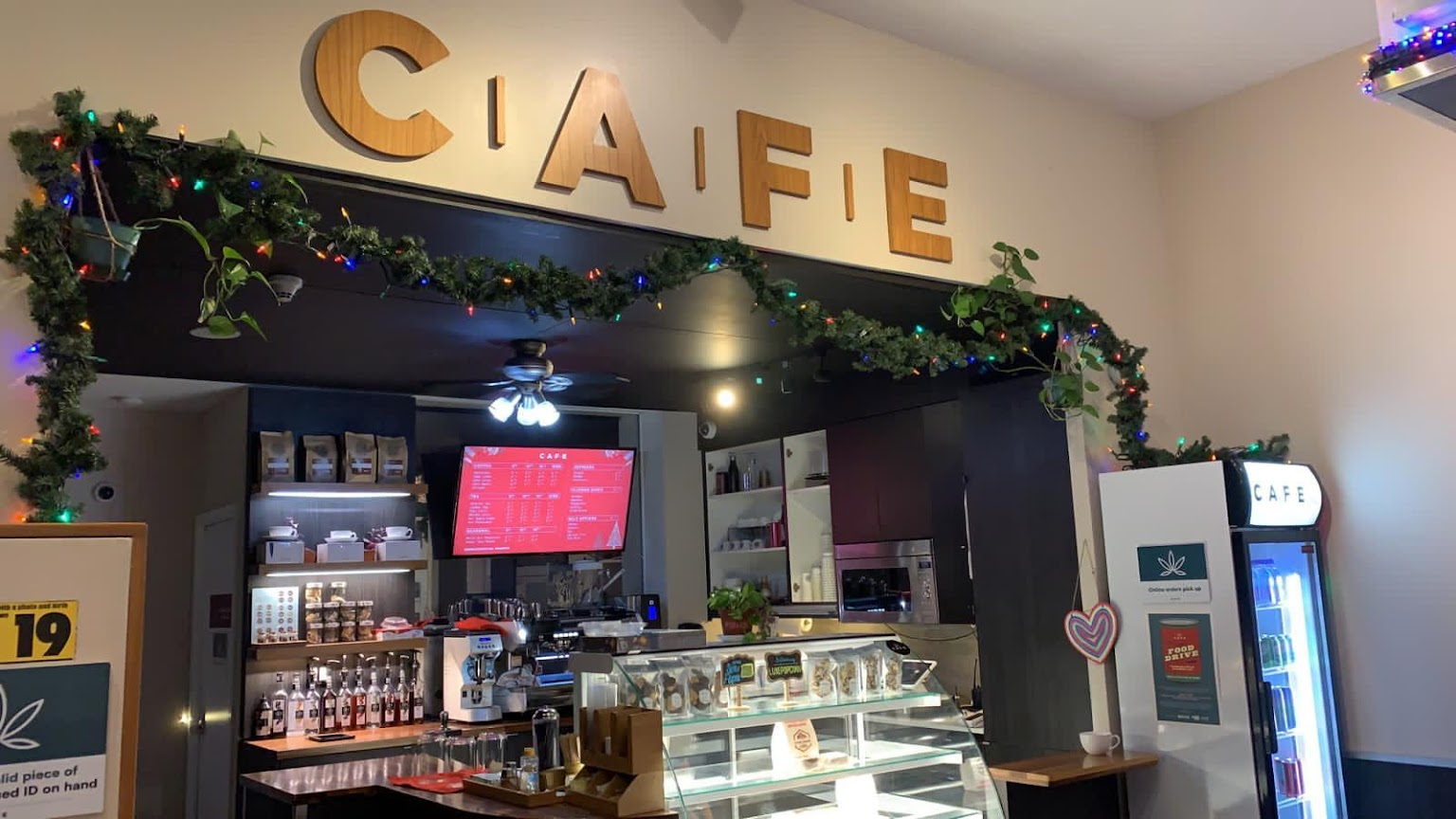 Company Logo For CAFE Dispensary'