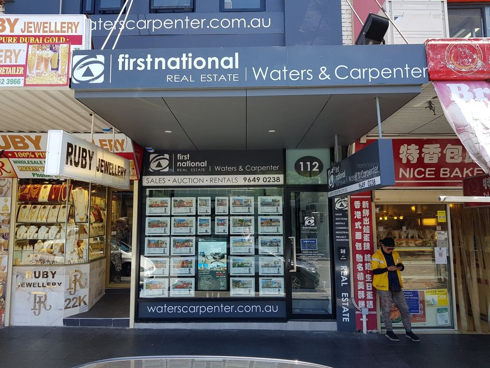 First National Real Estate Waters & Carpenter'