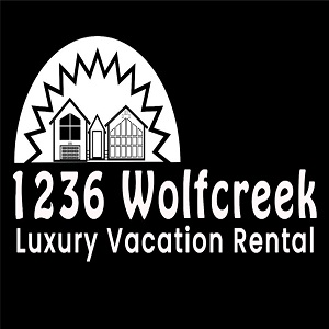 Company Logo For 1236 Wolf Creek Luxury Vacation Homes'