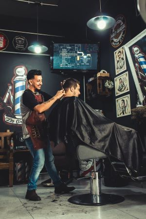Company Logo For OMZ Barbershop'