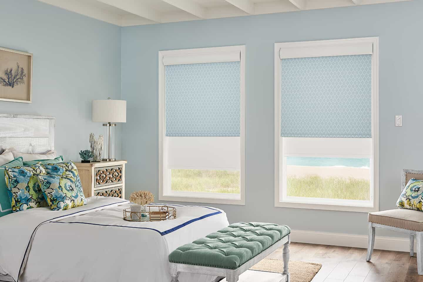 Light blue roller shades in bedroom