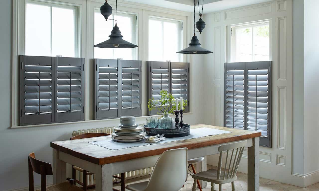 Grey shutters in dining room