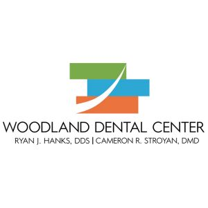 Company Logo For Woodland Dental Center'