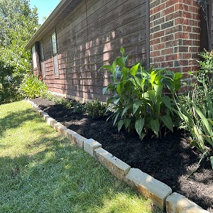 Company Logo For Grounded Lawn & Landscaping'