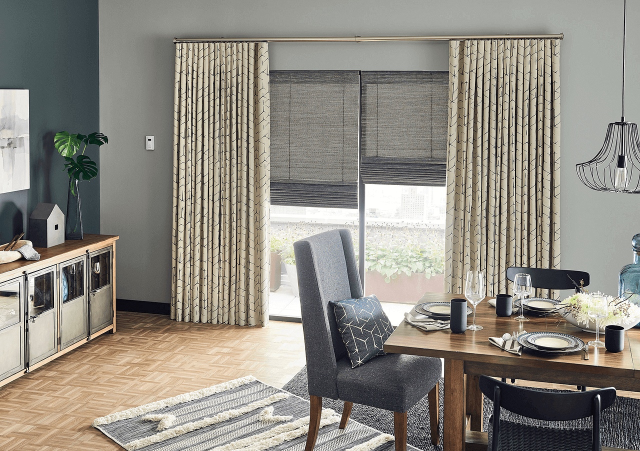 Cream colored drapes with shades