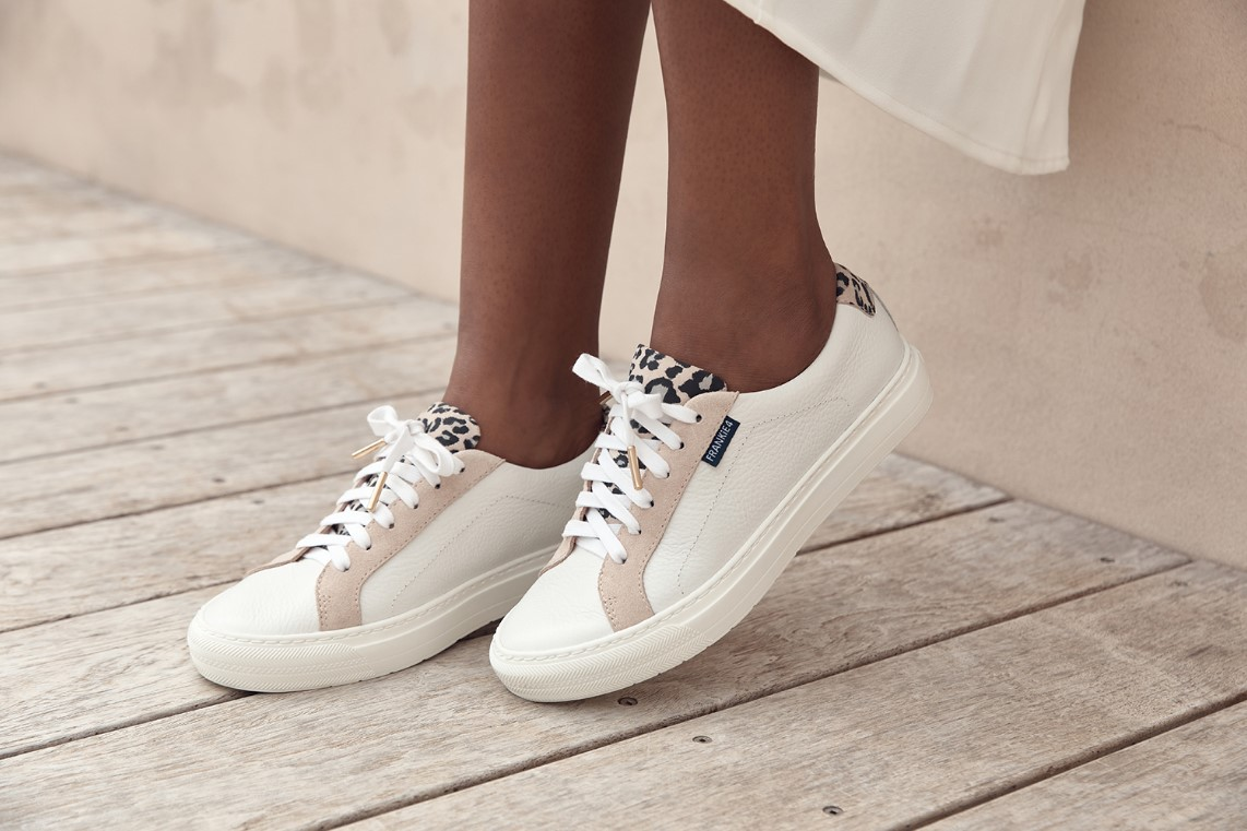 Company Logo For The Footwear Store'