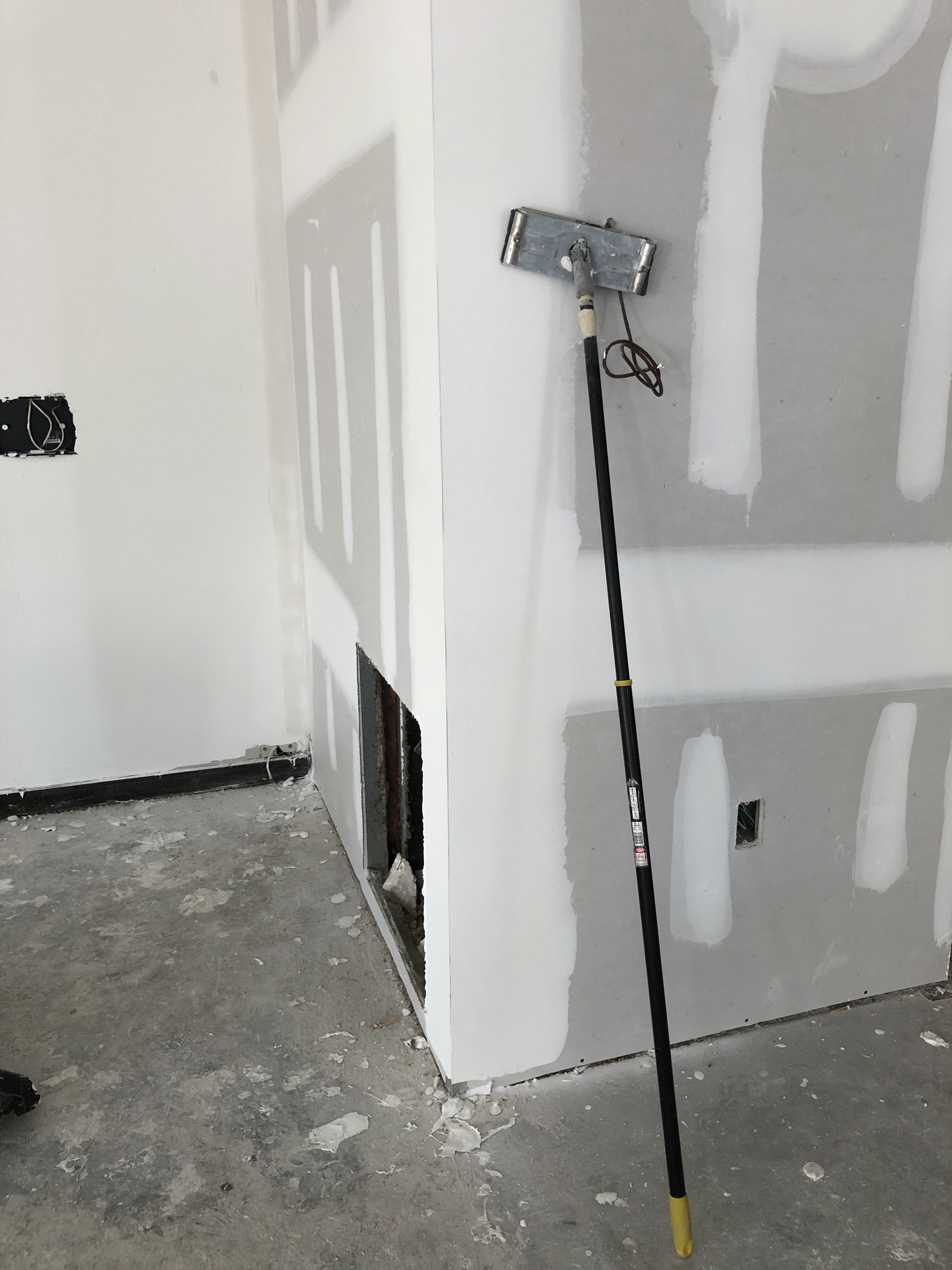 Pole Sander used for drywall finishing and repair'