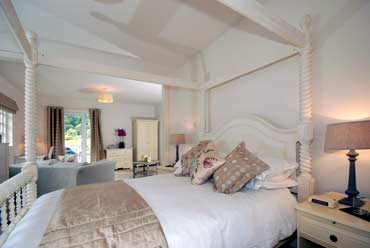 Sleep in a 4 poster bed at The Beach House'