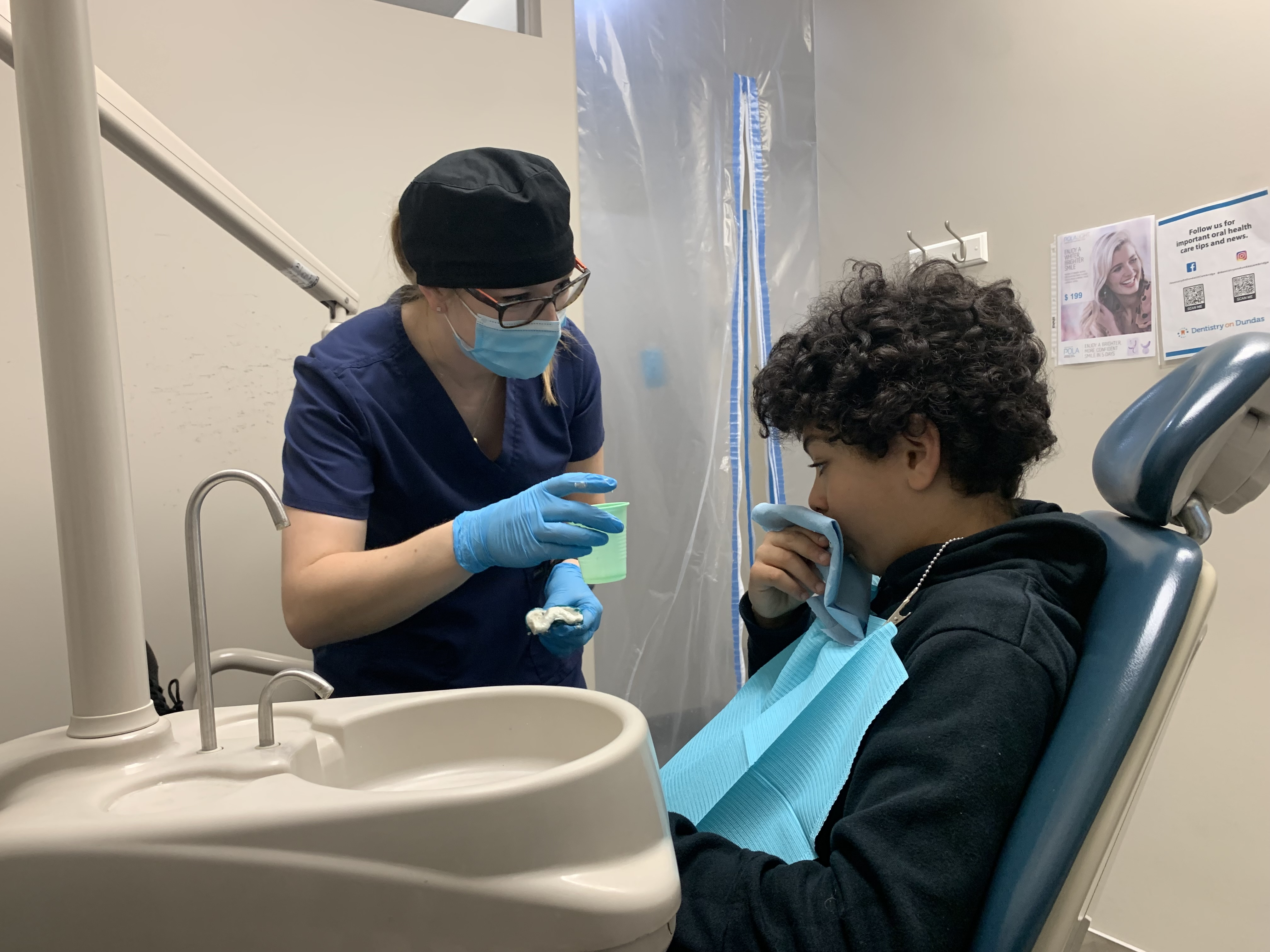 dentist treating a child'