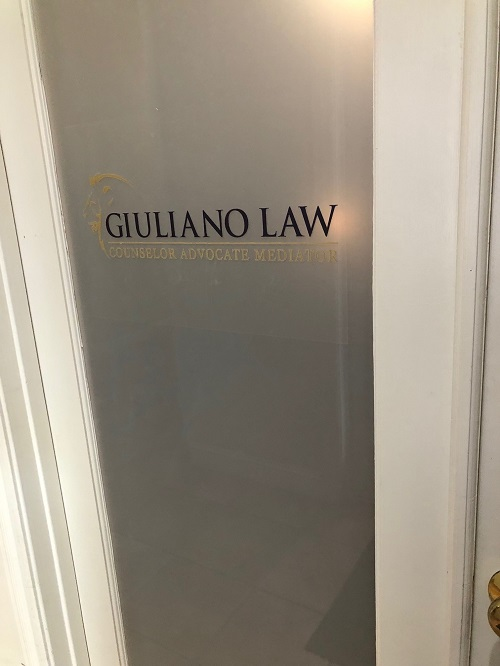 Company Logo For Giuliano Law'