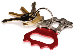 Used bicycle chain turned into bottle opener/key chain.'