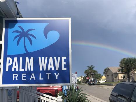 Company Logo For Palm Wave Realty'