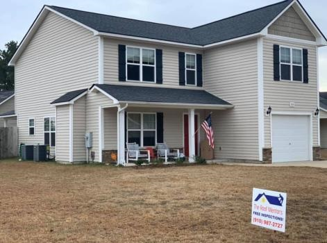 Company Logo For The Roof Mentors'