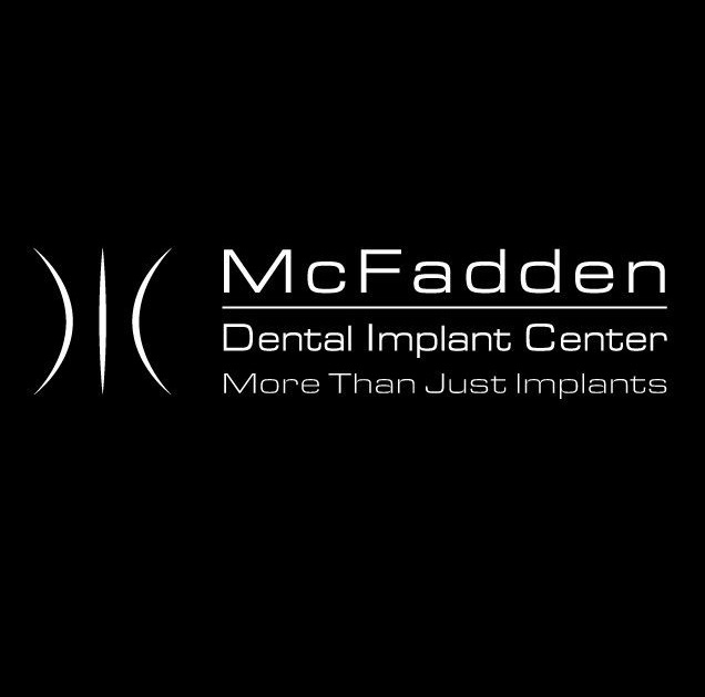 Company Logo For The Dental Implant Center'