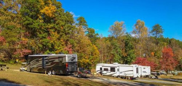 Company Logo For Spacious Skies Campgrounds - Hidden Creek'