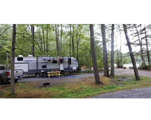 Company Logo For Spacious Skies Campgrounds - French Pond'