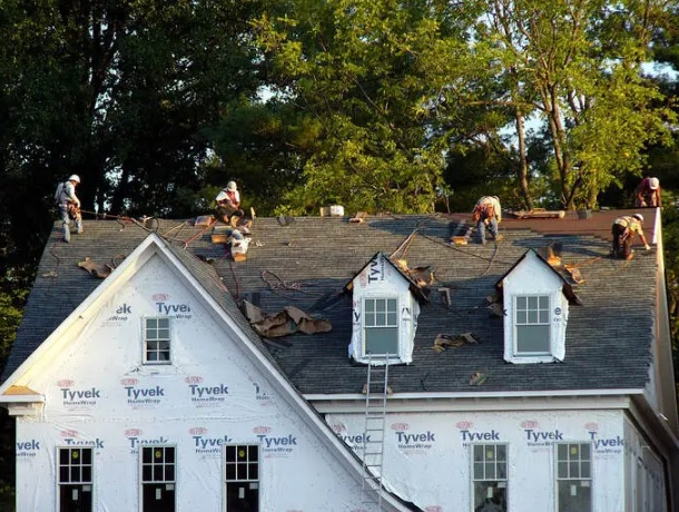 Company Logo For Revolutionary Roofing & Restoration'