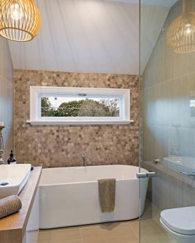 Company Logo For New Realm Homes'