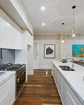 Company Logo For New Realm Homes'