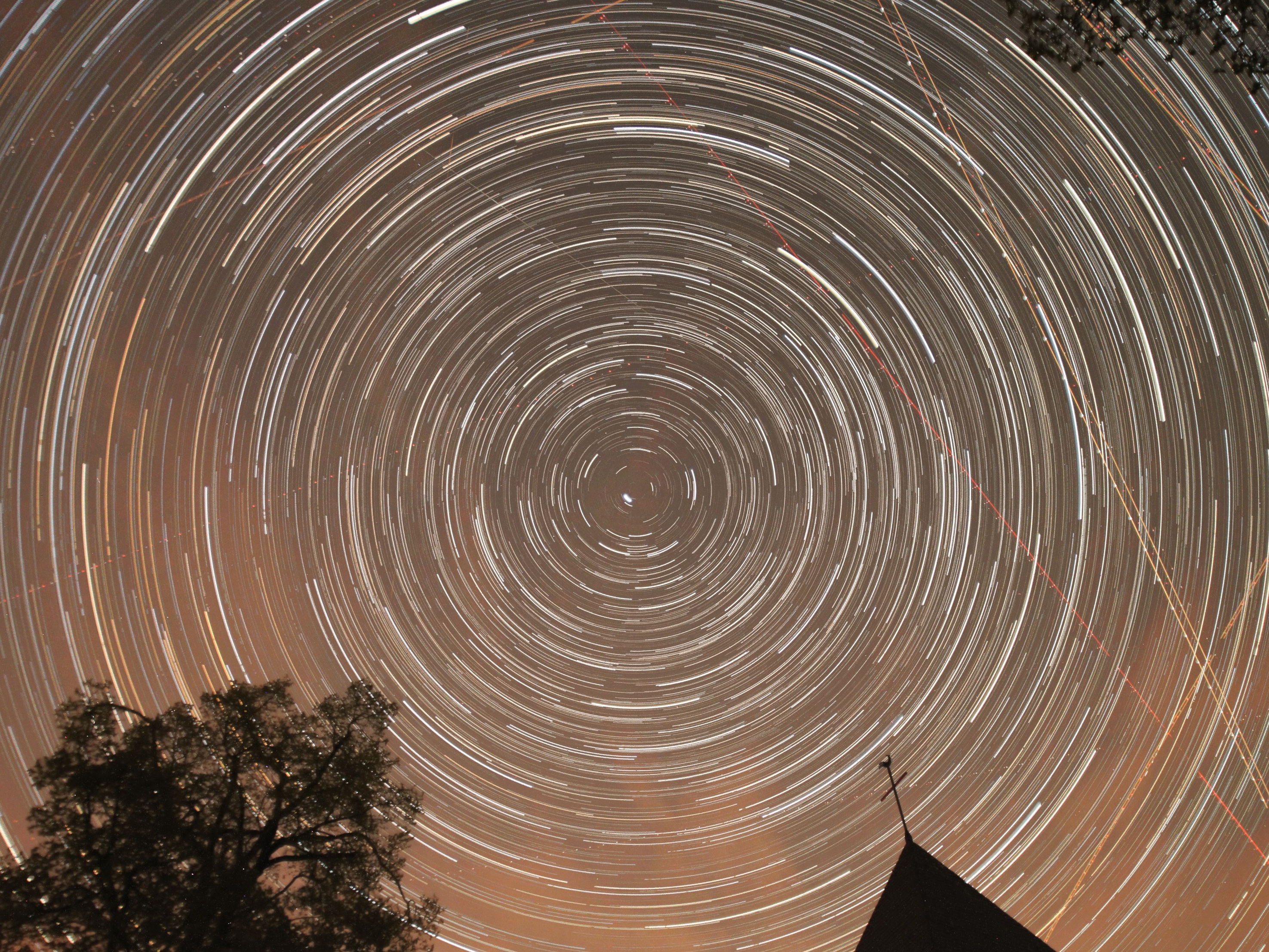 Star trails above the church at Wollseifen, Eifel National P'
