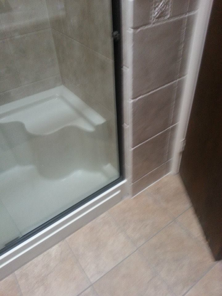 After&mdash;removal of tub and converted to seated showe