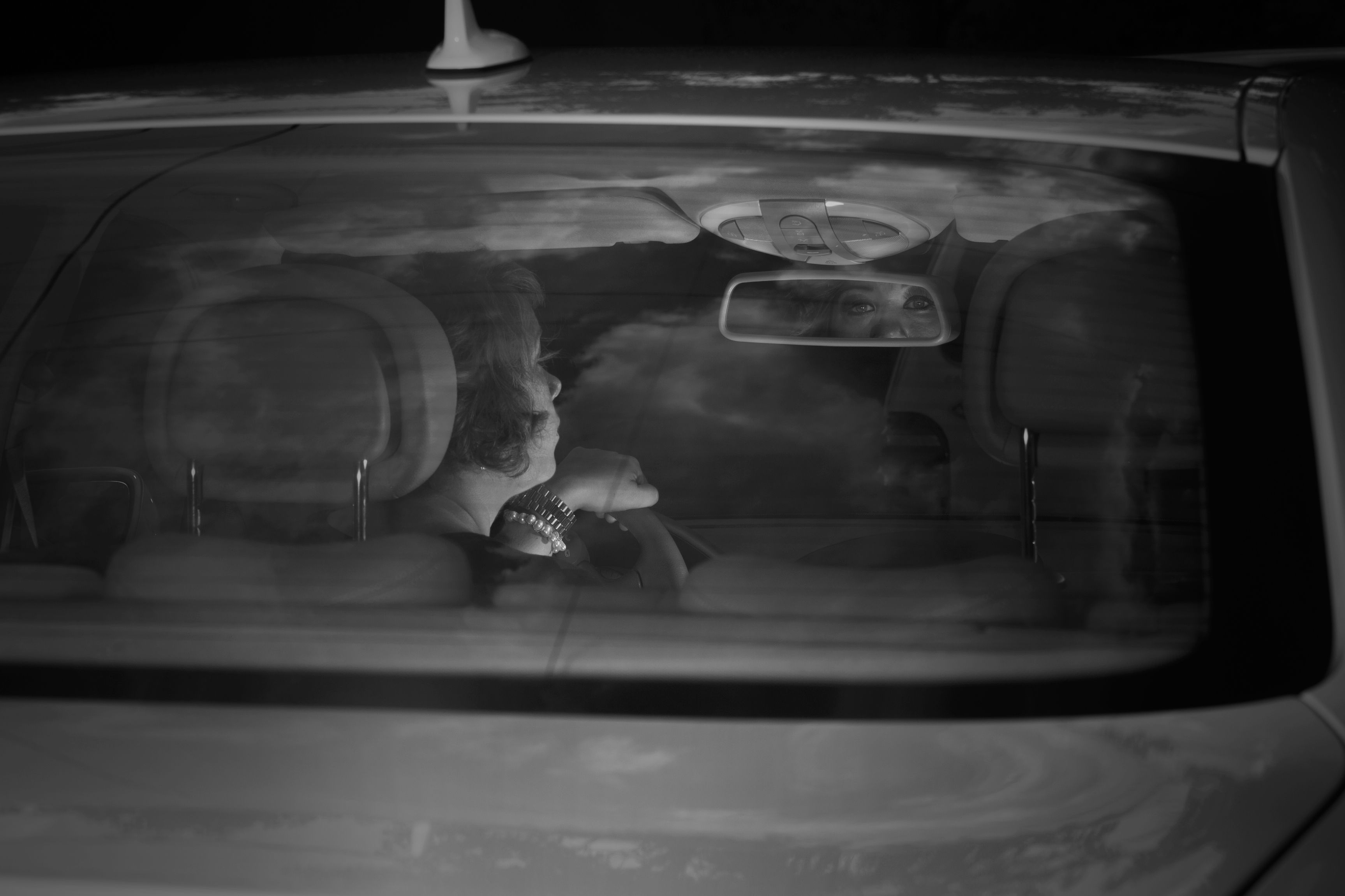 Woman sees death through rearview mirror