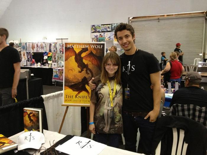 Author Matthew Wolf at book signing.'