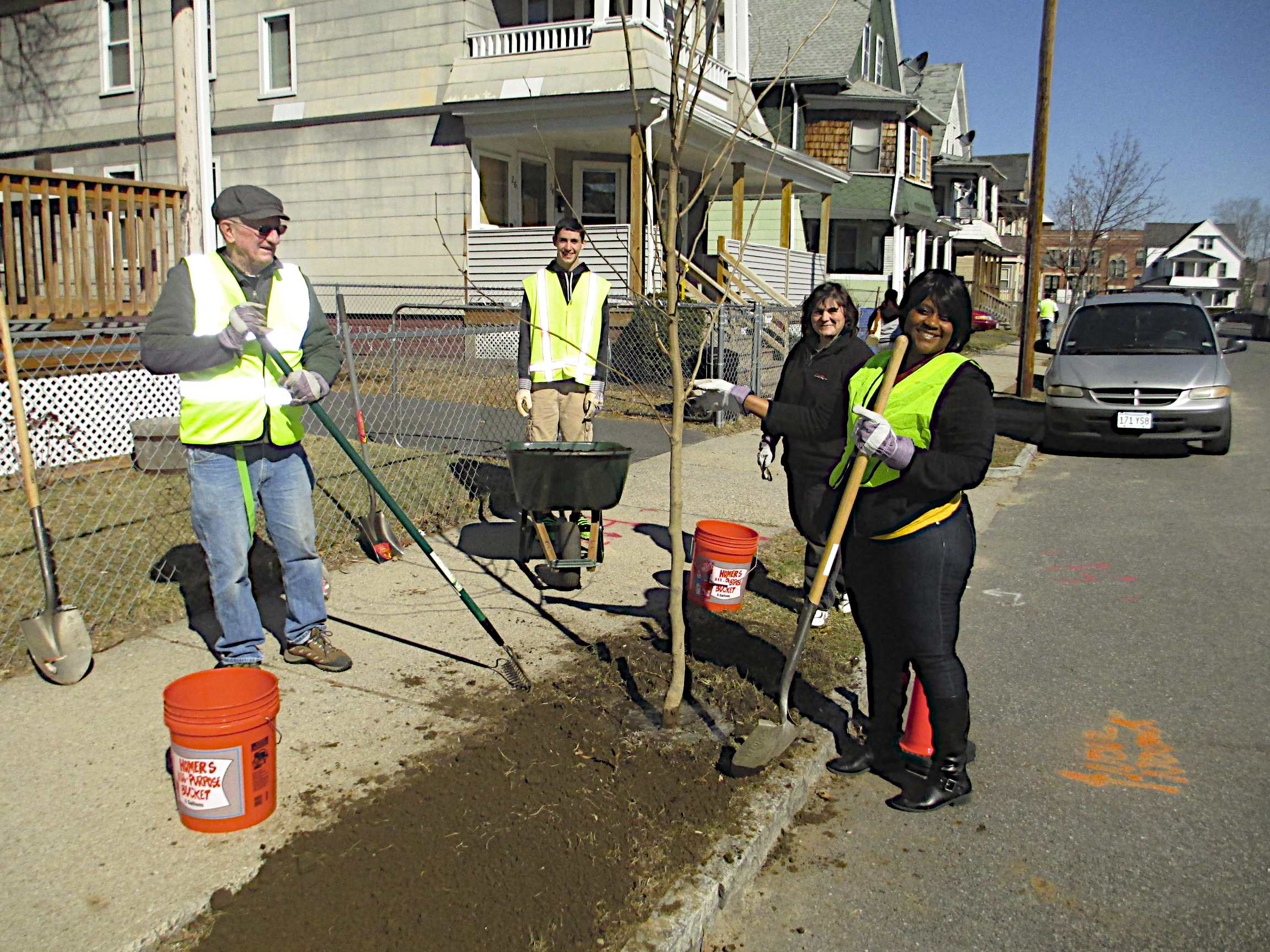 Volunteers Show Off Newly Planted Shade Tree