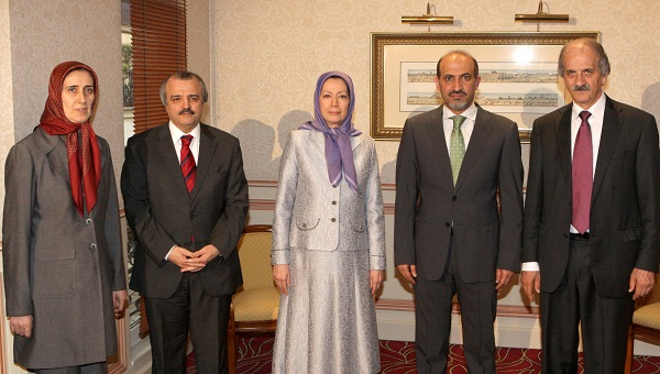 Mrs Maryam Rajavi and Mr Ahmed Jarba with conference audienc'