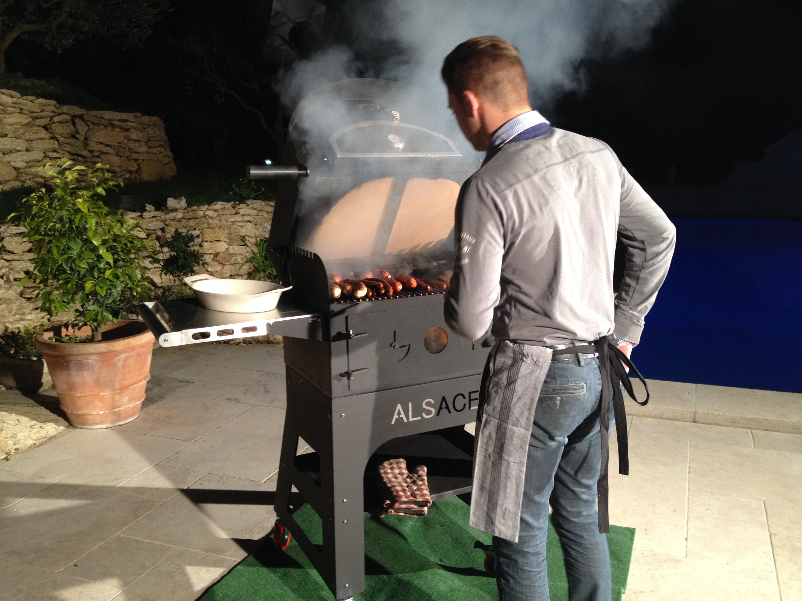 Alsace, outdoor wood-fired oven/grill in grilling position'