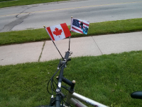 Canada and USA Flaggle Waggler on Bicycle
