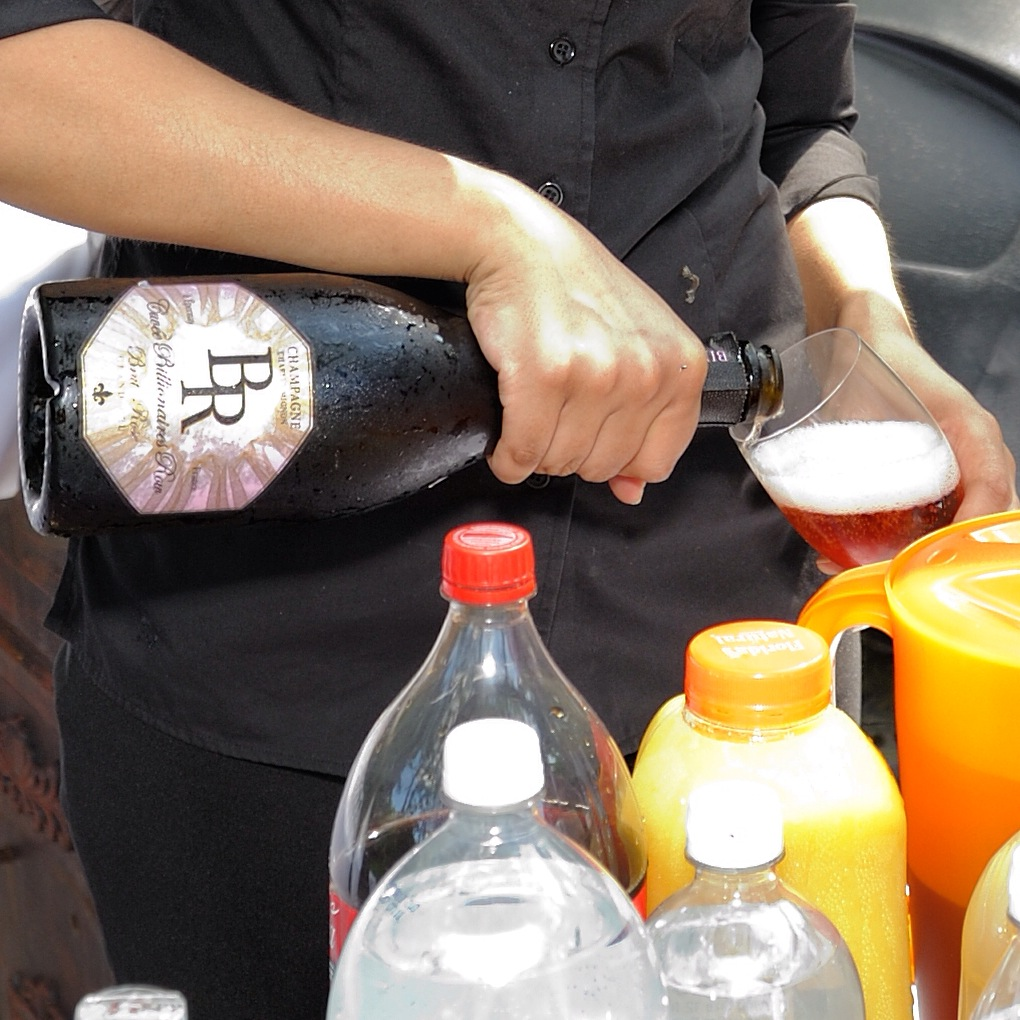 Pouring Billionaires Row Champagne'