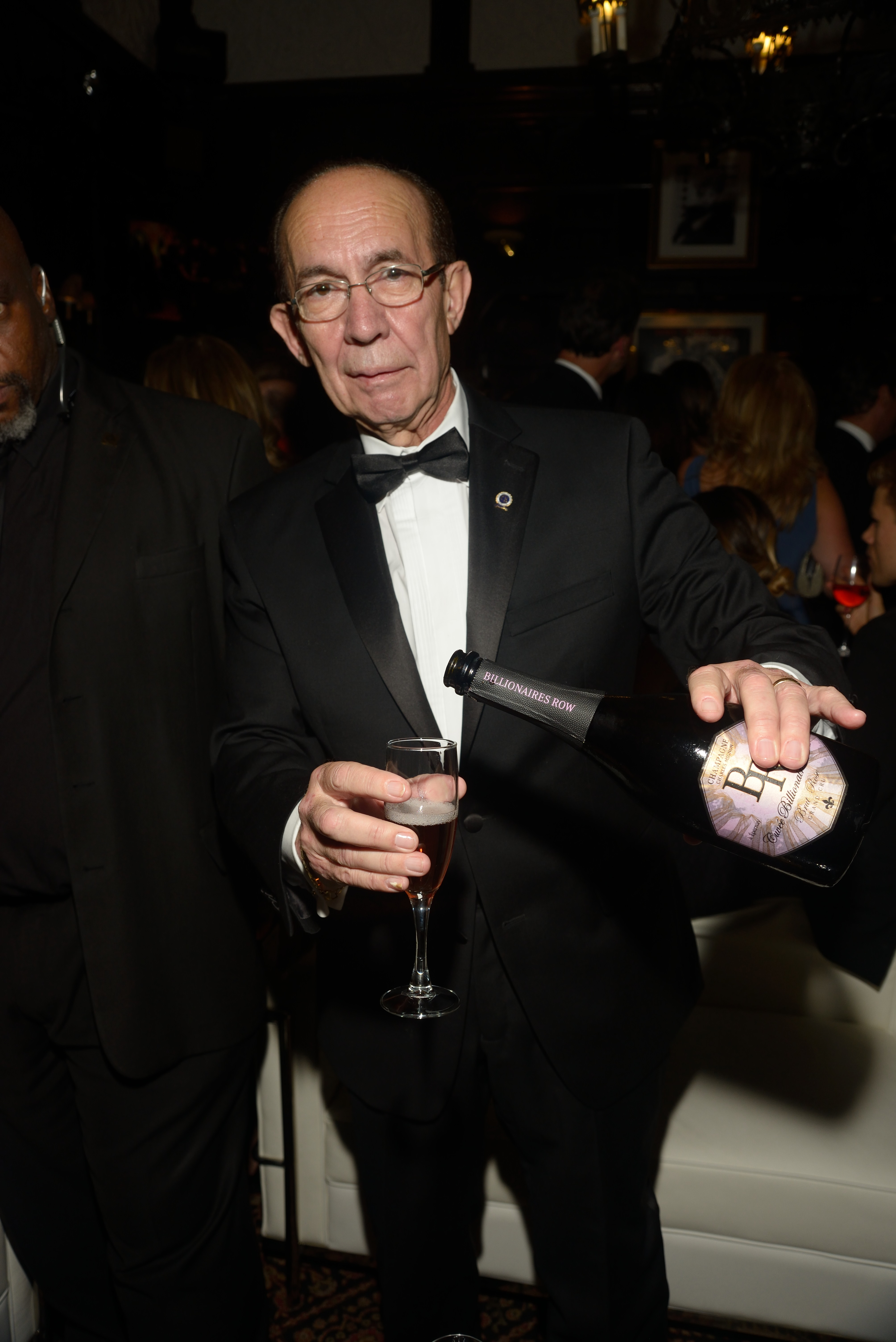 Pouring Billionaires Row Champagne'