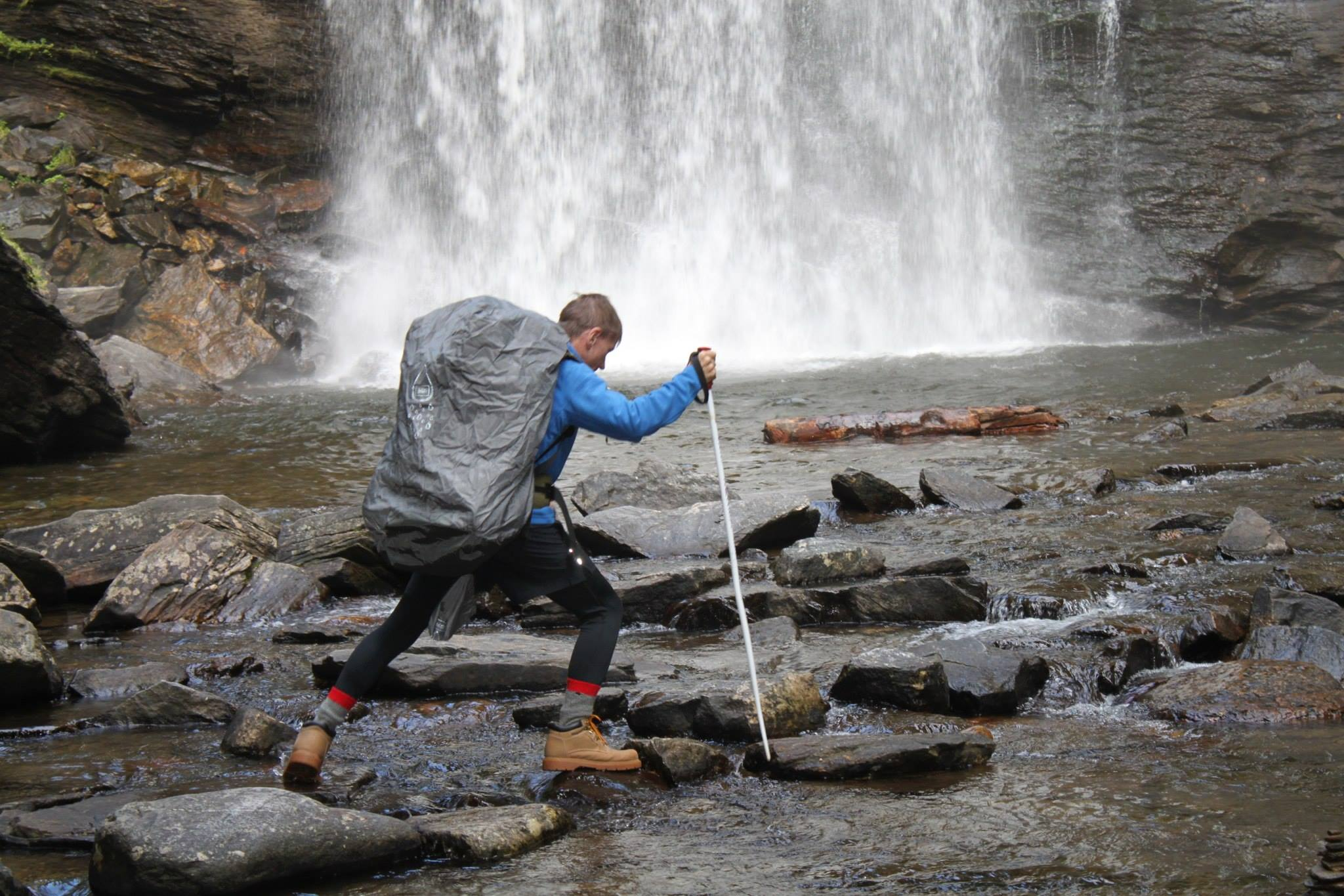 Actor Bill Oberst, Jr. crossing Looking Glass Falls'